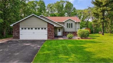 Nestled on a tranquil dead-end road, this stunning four-bedroom on Deacons Lodge Golf Course in Minnesota - for sale on GolfHomes.com, golf home, golf lot