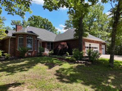 Discover this all-brick gem in the Oaks subdivision, perfectly on Twin Lakes Golf Club in Arkansas - for sale on GolfHomes.com, golf home, golf lot