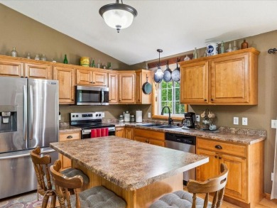 Nestled on a tranquil dead-end road, this stunning four-bedroom on Deacons Lodge Golf Course in Minnesota - for sale on GolfHomes.com, golf home, golf lot