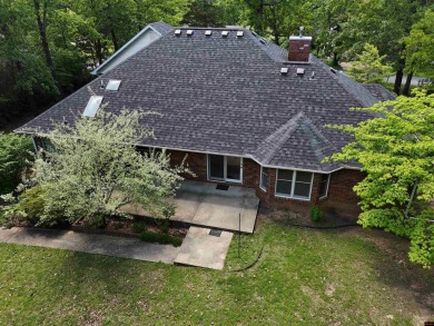 Discover this all-brick gem in the Oaks subdivision, perfectly on Twin Lakes Golf Club in Arkansas - for sale on GolfHomes.com, golf home, golf lot