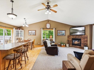 Nestled on a tranquil dead-end road, this stunning four-bedroom on Deacons Lodge Golf Course in Minnesota - for sale on GolfHomes.com, golf home, golf lot