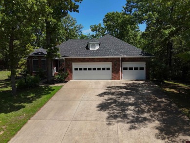 Discover this all-brick gem in the Oaks subdivision, perfectly on Twin Lakes Golf Club in Arkansas - for sale on GolfHomes.com, golf home, golf lot