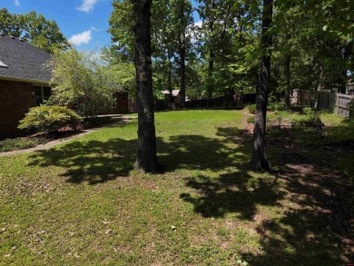 Discover this all-brick gem in the Oaks subdivision, perfectly on Twin Lakes Golf Club in Arkansas - for sale on GolfHomes.com, golf home, golf lot