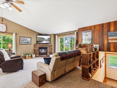 Nestled on a tranquil dead-end road, this stunning four-bedroom on Deacons Lodge Golf Course in Minnesota - for sale on GolfHomes.com, golf home, golf lot