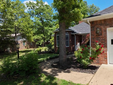 Discover this all-brick gem in the Oaks subdivision, perfectly on Twin Lakes Golf Club in Arkansas - for sale on GolfHomes.com, golf home, golf lot