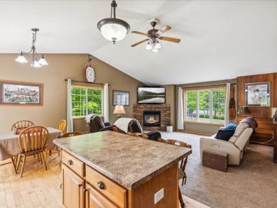 Nestled on a tranquil dead-end road, this stunning four-bedroom on Deacons Lodge Golf Course in Minnesota - for sale on GolfHomes.com, golf home, golf lot