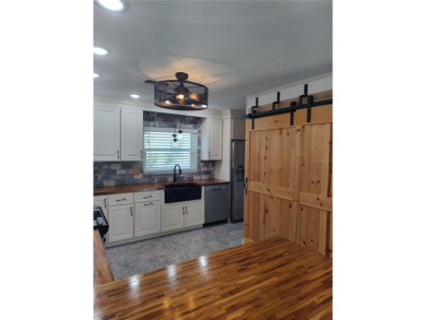 PRICE IMPROVEMENT!!!!You will love this spacious end unit on The Dunedin Country Club in Florida - for sale on GolfHomes.com, golf home, golf lot