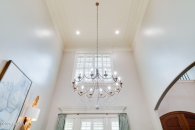 Nestled in the prestigious gated community of Le Triomphe Golf & on LeTriomphe Golf and Country Club in Louisiana - for sale on GolfHomes.com, golf home, golf lot