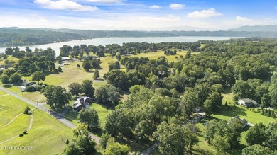 Situated on a beautifully wooded lot in the heart of Baneberry on Baneberry Golf and Resort Club in Tennessee - for sale on GolfHomes.com, golf home, golf lot