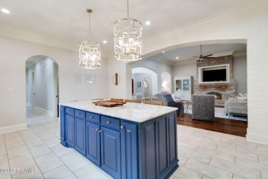 Nestled in the prestigious gated community of Le Triomphe Golf & on LeTriomphe Golf and Country Club in Louisiana - for sale on GolfHomes.com, golf home, golf lot
