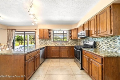 Outstanding, updated golf course home offering unmatched luxury on Suntree Country Club in Florida - for sale on GolfHomes.com, golf home, golf lot
