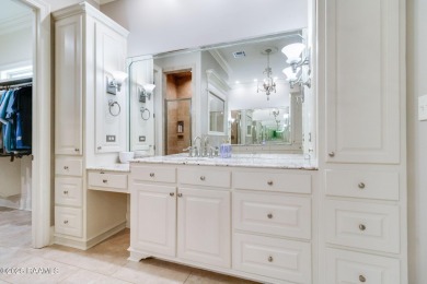 Nestled in the prestigious gated community of Le Triomphe Golf & on LeTriomphe Golf and Country Club in Louisiana - for sale on GolfHomes.com, golf home, golf lot