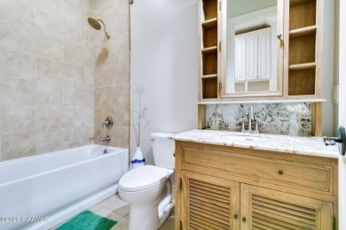 Nestled in the prestigious gated community of Le Triomphe Golf & on LeTriomphe Golf and Country Club in Louisiana - for sale on GolfHomes.com, golf home, golf lot