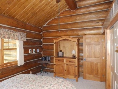 Amazing fully furnished log home on the 6th tee of Garland's on Garland Resort and Golf Club  in Michigan - for sale on GolfHomes.com, golf home, golf lot