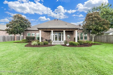 Nestled in the prestigious gated community of Le Triomphe Golf & on LeTriomphe Golf and Country Club in Louisiana - for sale on GolfHomes.com, golf home, golf lot