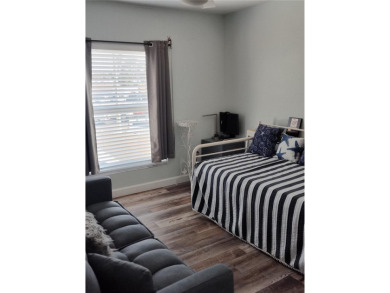 PRICE IMPROVEMENT!!!!You will love this spacious end unit on The Dunedin Country Club in Florida - for sale on GolfHomes.com, golf home, golf lot