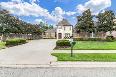 Nestled in the prestigious gated community of Le Triomphe Golf & on LeTriomphe Golf and Country Club in Louisiana - for sale on GolfHomes.com, golf home, golf lot