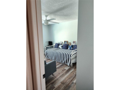 PRICE IMPROVEMENT!!!!You will love this spacious end unit on The Dunedin Country Club in Florida - for sale on GolfHomes.com, golf home, golf lot