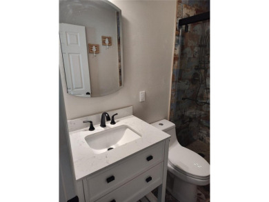 PRICE IMPROVEMENT!!!!You will love this spacious end unit on The Dunedin Country Club in Florida - for sale on GolfHomes.com, golf home, golf lot