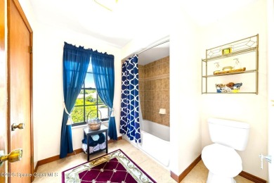 Outstanding, updated golf course home offering unmatched luxury on Suntree Country Club in Florida - for sale on GolfHomes.com, golf home, golf lot