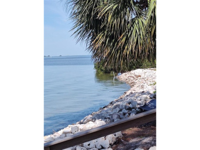 PRICE IMPROVEMENT!!!!You will love this spacious end unit on The Dunedin Country Club in Florida - for sale on GolfHomes.com, golf home, golf lot