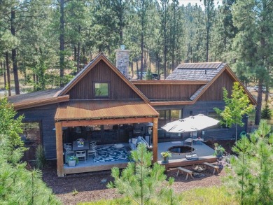 Tucked at the edge of the forest against a backdrop of manicured on Wilderness Club in Montana - for sale on GolfHomes.com, golf home, golf lot