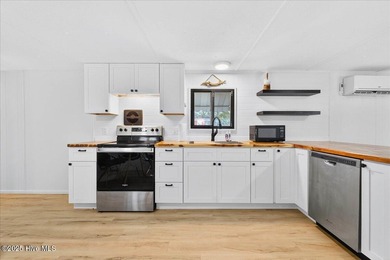 Your Dream Beach Escape Awaits at Sunset Beach! Yes-dreams on Oyster Bay Golf Links in North Carolina - for sale on GolfHomes.com, golf home, golf lot