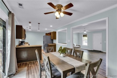 Opportunity doesn't knock-it shows up with curb appeal, fresh on Woodlake Country Club in North Carolina - for sale on GolfHomes.com, golf home, golf lot