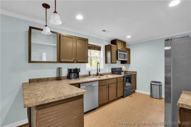 Opportunity doesn't knock-it shows up with curb appeal, fresh on Woodlake Country Club in North Carolina - for sale on GolfHomes.com, golf home, golf lot