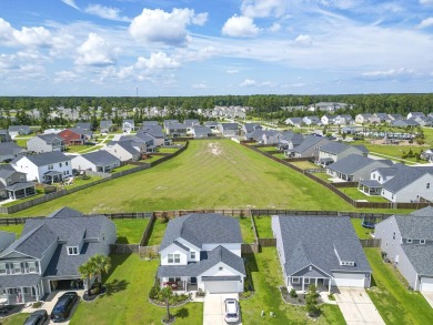 Welcome home to this stunning 4-bedroom, 2.5-bathroom property on Cypress Point Par 3 in South Carolina - for sale on GolfHomes.com, golf home, golf lot