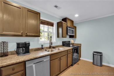 Opportunity doesn't knock-it shows up with curb appeal, fresh on Woodlake Country Club in North Carolina - for sale on GolfHomes.com, golf home, golf lot