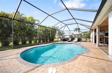 Quiet Coral Oaks Golf Course Home with Screened Pool & Sunset on Burnt Store Golf Club in Florida - for sale on GolfHomes.com, golf home, golf lot