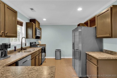 Opportunity doesn't knock-it shows up with curb appeal, fresh on Woodlake Country Club in North Carolina - for sale on GolfHomes.com, golf home, golf lot
