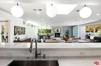 Extensively renovated and expanded Mediterranean home on Wilshire Country Club in California - for sale on GolfHomes.com, golf home, golf lot