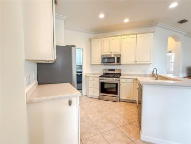 This meticulously maintained Haddington model home, located on a on Scepter Golf Club in Florida - for sale on GolfHomes.com, golf home, golf lot