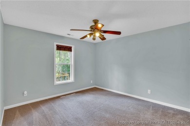 Opportunity doesn't knock-it shows up with curb appeal, fresh on Woodlake Country Club in North Carolina - for sale on GolfHomes.com, golf home, golf lot