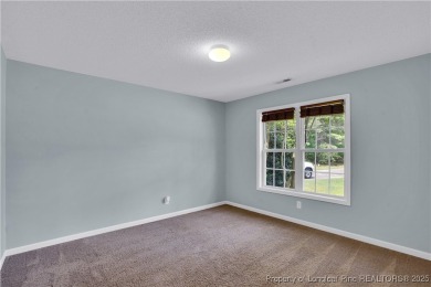 Opportunity doesn't knock-it shows up with curb appeal, fresh on Woodlake Country Club in North Carolina - for sale on GolfHomes.com, golf home, golf lot
