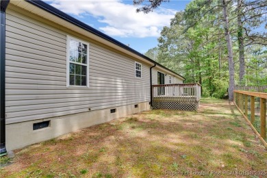 Opportunity doesn't knock-it shows up with curb appeal, fresh on Woodlake Country Club in North Carolina - for sale on GolfHomes.com, golf home, golf lot
