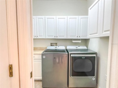 This meticulously maintained Haddington model home, located on a on Scepter Golf Club in Florida - for sale on GolfHomes.com, golf home, golf lot