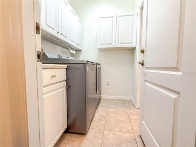 This meticulously maintained Haddington model home, located on a on Scepter Golf Club in Florida - for sale on GolfHomes.com, golf home, golf lot