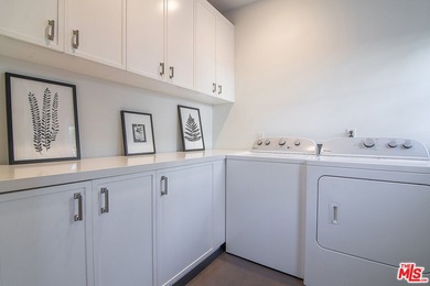 Extensively renovated and expanded Mediterranean home on Wilshire Country Club in California - for sale on GolfHomes.com, golf home, golf lot