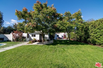 Extensively renovated and expanded Mediterranean home on Wilshire Country Club in California - for sale on GolfHomes.com, golf home, golf lot