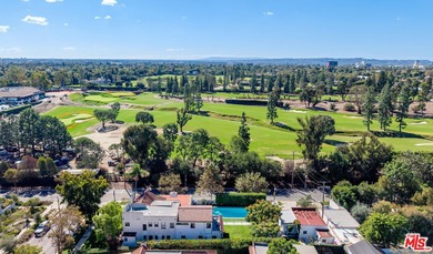 Extensively renovated and expanded Mediterranean home on Wilshire Country Club in California - for sale on GolfHomes.com, golf home, golf lot