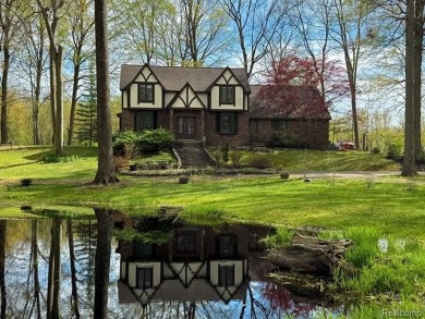Welcome to this charming English Tudor home, nestled in tranquil on River Bank Golf Course in Michigan - for sale on GolfHomes.com, golf home, golf lot