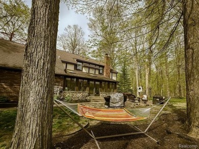Welcome to this charming English Tudor home, nestled in tranquil on River Bank Golf Course in Michigan - for sale on GolfHomes.com, golf home, golf lot
