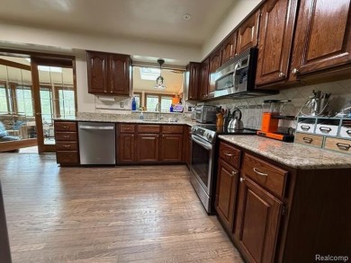 Welcome to this charming English Tudor home, nestled in tranquil on River Bank Golf Course in Michigan - for sale on GolfHomes.com, golf home, golf lot
