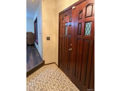 Welcome to this charming English Tudor home, nestled in tranquil on River Bank Golf Course in Michigan - for sale on GolfHomes.com, golf home, golf lot
