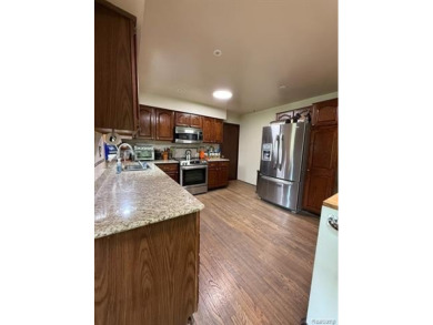 Welcome to this charming English Tudor home, nestled in tranquil on River Bank Golf Course in Michigan - for sale on GolfHomes.com, golf home, golf lot