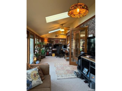 Welcome to this charming English Tudor home, nestled in tranquil on River Bank Golf Course in Michigan - for sale on GolfHomes.com, golf home, golf lot