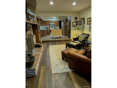 Welcome to this charming English Tudor home, nestled in tranquil on River Bank Golf Course in Michigan - for sale on GolfHomes.com, golf home, golf lot